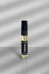 Vape pen with 'Tobacco' label on a metallic background