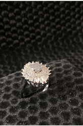 Diamond ring on a textured black surface
