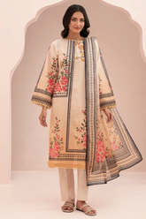 Woman wearing a traditional outfit with floral embroidery on a beige background