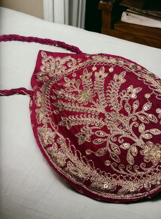 Elegant Drop Shape Clutch Bag with Intricate Tilla Work