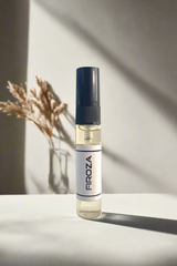 Firoza perfume bottle on a gray background