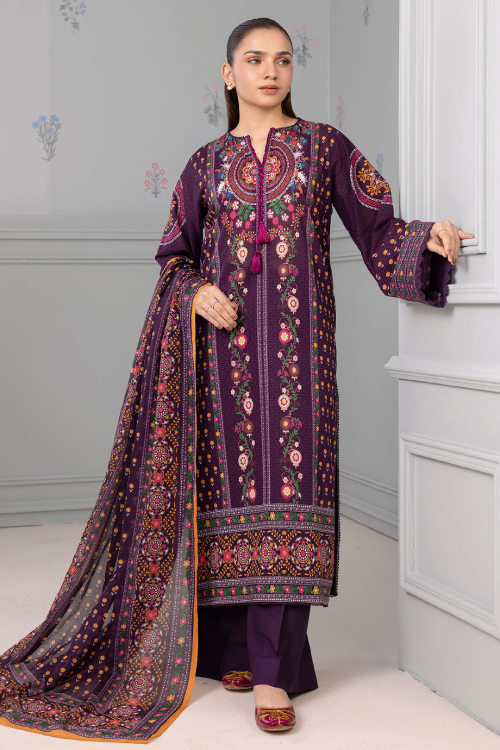 Woman wearing a traditional embroidered outfit with a purple theme in a minimalistic setting.