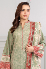 Woman wearing a traditional outfit with green and red patterns on a plain background